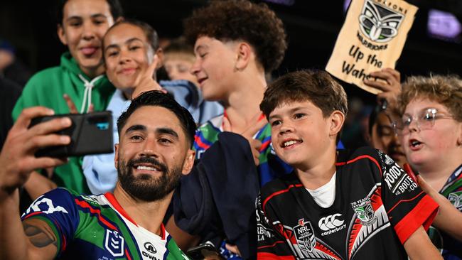 AUCKLAND, NEW ZEALAND - MARCH 08: Shaun Johnson of the Warriors poses with fans following the round one NRL match between New Zealand Warriors and Cronulla Sharks at Go Media Stadium Mt Smart, on March 08, 2024, in Auckland, New Zealand. (Photo by Hannah Peters/Getty Images)