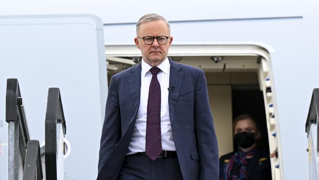 Australian Prime Minister Anthony Albanese disembarks the plane on arrival in Perth, Australia, Tuesday, July 5, 2022. Mr Albanese arrived back in Australia following a 8-day long trip to Europe. (AAP Image/Lukas Coch) NO ARCHIVING