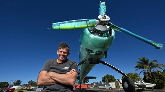 Aerobatic pilot and engineer Hayden Pullen with one half of the Yak 110 he will reassemble for the Pacific Airshow on the Gold Coast. Picture: Lyndon Mechielsen