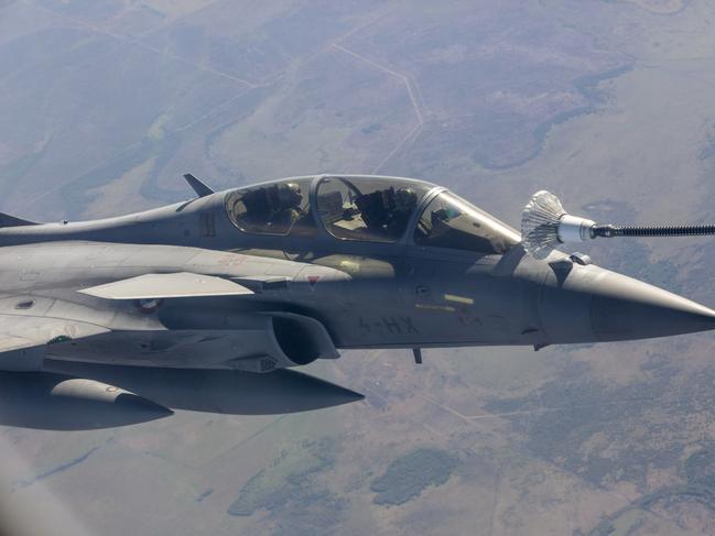 A French Rafale jet refuels mid-air about 100km south of Darwin. Picture: Floss Adams.