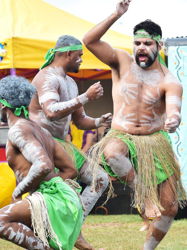 Hayden Saltner (right) performs with the Wulgurukaba Walkabout dance group to celebrate NAIDOC week. Picture: Shae Beplate.