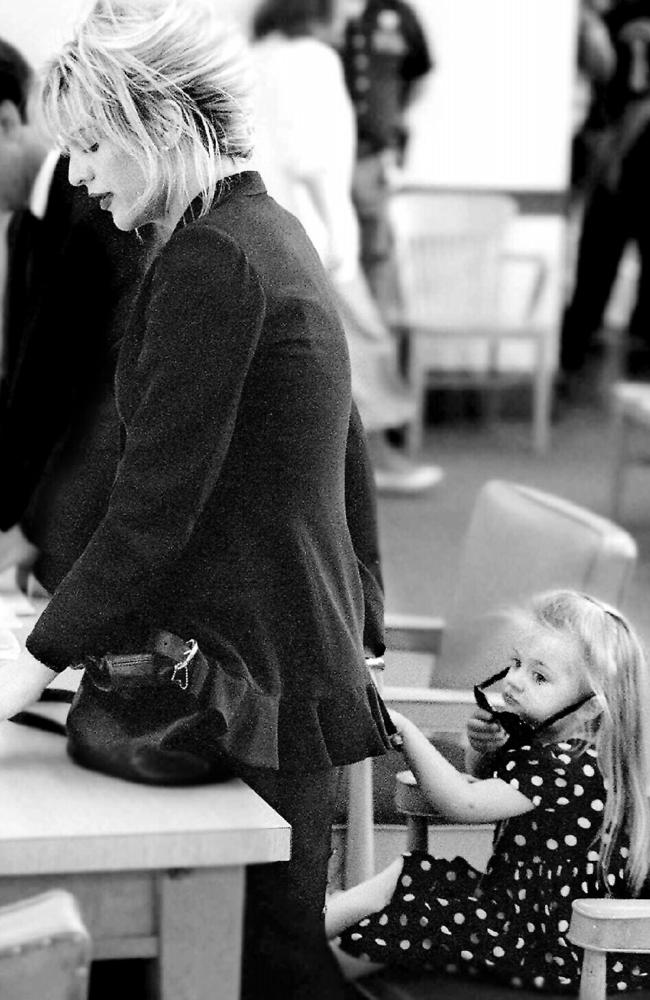 Mummy’s girl ... Courtney Love and Frances Bean Cobain at a Washington court, where Love was facing charges in 1995. Picture: AP