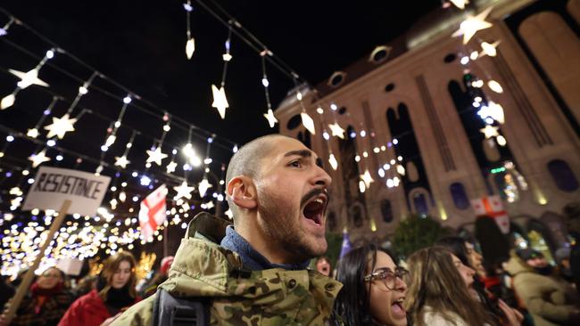 Opponents of the new president outside the parliament. Picture: AFP