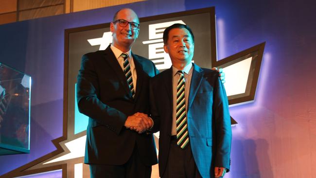 Port Adelaide president David Koch and Shanghai billionaire Gui Guojie.