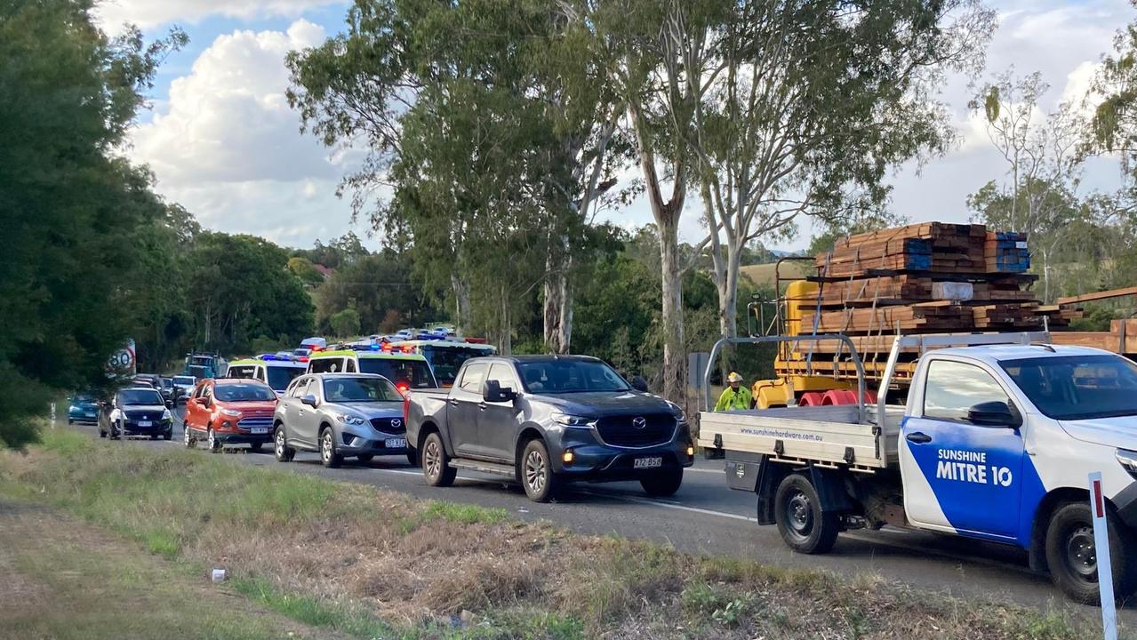 Traffic is backed up at least 200m on the road.