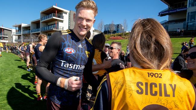 James Sicily signs a fan’s jumper at training. Picture: Jay Town