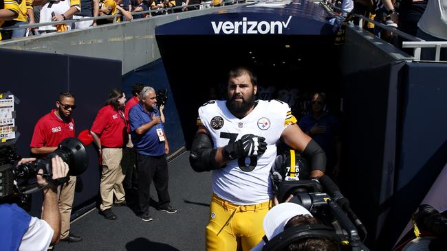 Alejandro Villanueva of the Pittsburgh Steelers stood by himself as the rest of his team stayed in the locker room while the anthem was sung. Pic: AFP