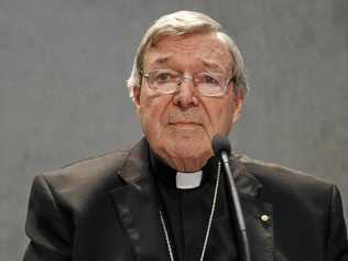 Cardinal George Pell meets the media, at the Vatican, Thursday, June 29, 2017. The Catholic Archdiocese of Sydney says Vatican Cardinal George Pell will return to Australia to fight sexual assault charges as soon as possible. (AP Photo/Gregorio Borgia). Picture: Gregorio Borgia