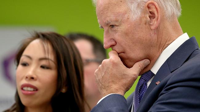 Professor Sherene Loi discusses her research with now President of the United States Joe Biden when he visited Melbourne in 2016. Picture: Mark Stewart