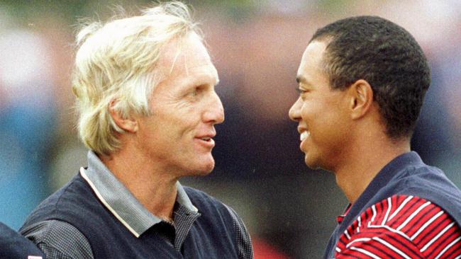 International Presidents Cup golfer Greg Norman, left, congratulates American Tiger Woods after Woods had beaten him 1-up at Royal Melbourne Golf Course in 1998 Picture: AP