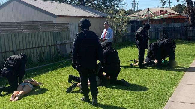 Police charge three people during search warrants at Lake Macquarie