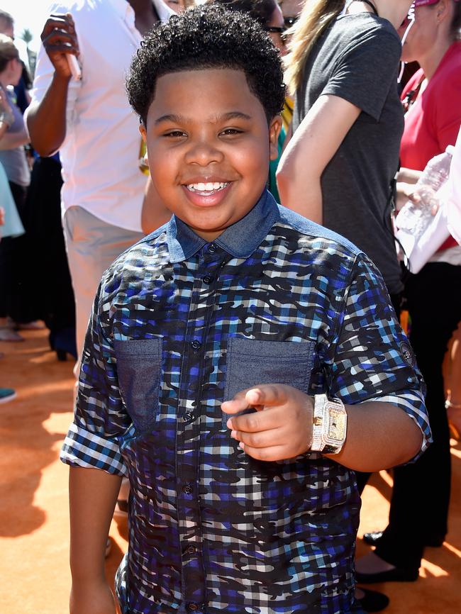 Actor Lil' P-Nut on the orange carpet.