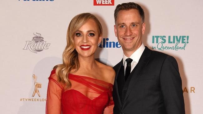 Carrie Bickmore (left) and partner Chris Walker at the 2019 Logie Awards at The Star Casino on the Gold Coast. Picture: AAP Image/Dan Peled.