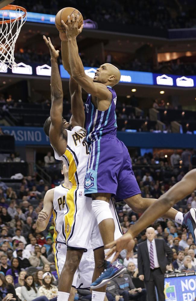 Charlotte Hornets' Gerald Henderson shoots over Indiana Pacers' Ian Mahinmi.