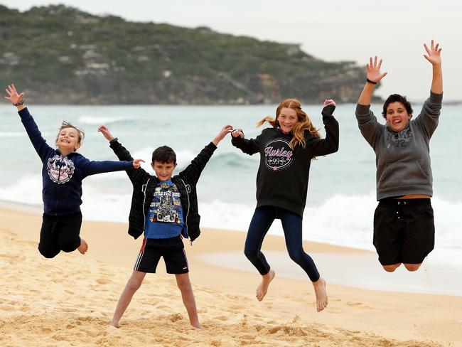 Stewart House kids enjoy getting active at South Curl Curl Beach. Stewart House. Picture: Troy Snook