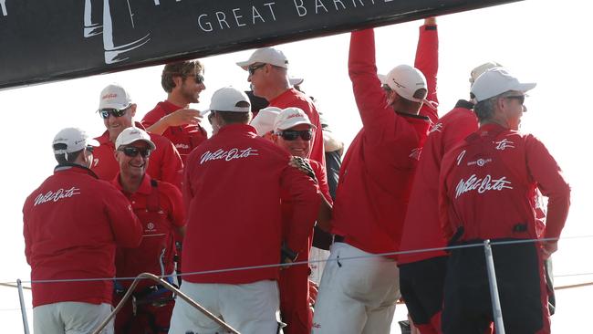 Crew members of Wild Oats XI celebrate their win. Picture: AAP 