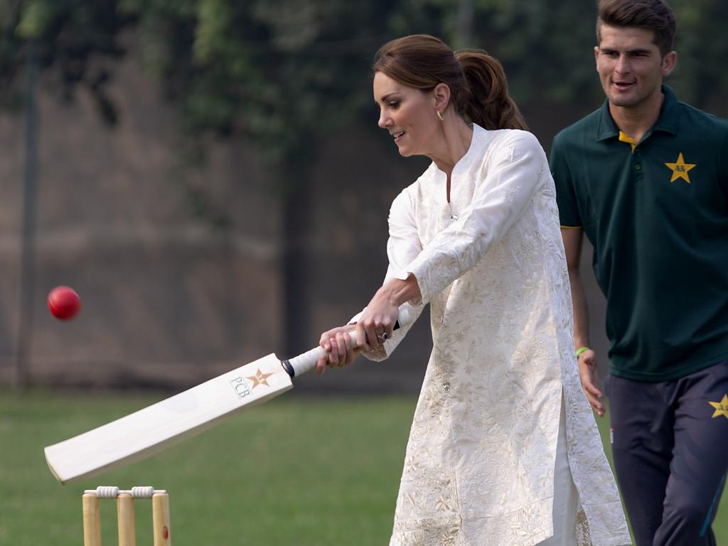 Britain's Kate, Duchess of Cambridge plays cricket as Pakistani bowler Shaheen Afridi looks on. Picture: AP Photo