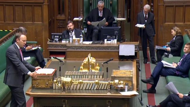 Britain's Health Secretary Matt Hancock (L) gives a statement to the House on coronavirus. Picture: AFP.