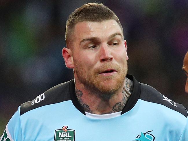 MELBOURNE, AUSTRALIA - AUGUST 12:  Josh Dugan of the Sharks (L) in action during the round 22 NRL match between the Melbourne Storm and the Cronulla Sharks at AAMI Park on August 12, 2018 in Melbourne, Australia.  (Photo by Graham Denholm/Getty Images)