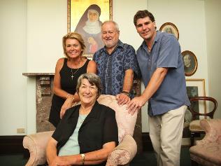 Miracle or not? ... Kathleen Evans, pictured at Mary Mackillop Memorial Chapel, North Sydney, with husband Barry and children Annette and Luke / Pic: James Elsby