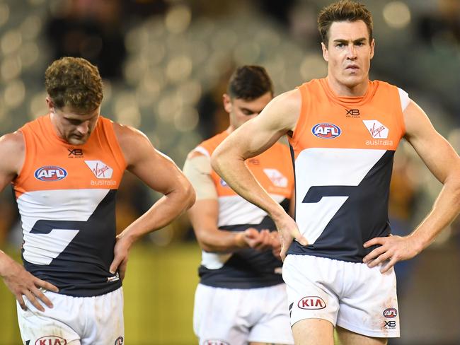 Jeremy Cameron of the Giants (centre) reacts after the Round 8 AFL match between the Hawthorn Hawks and the GWS Giants at the MCG in Melbourne, Sunday, May 12, 2019.  (AAP Image/Julian Smith) NO ARCHIVING, EDITORIAL USE ONLY