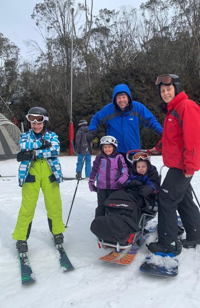 Cooper with his family at Thredbo. Picture: Supplied