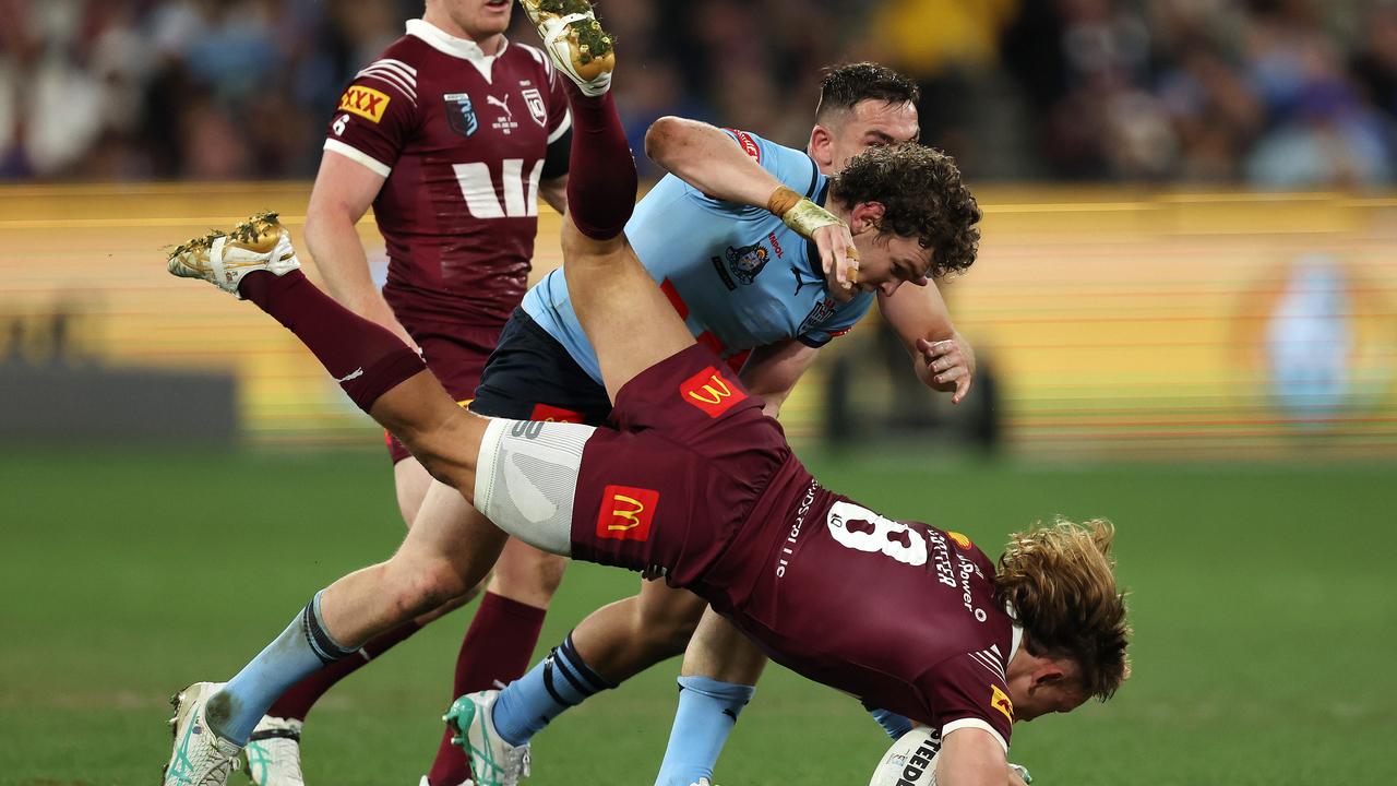 Liam Martin tackles Reuben Cotter in Game 2. Picture: Mark Stewart