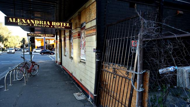 The Alexandria Hotel is currently boarded up and covered in graffiti.