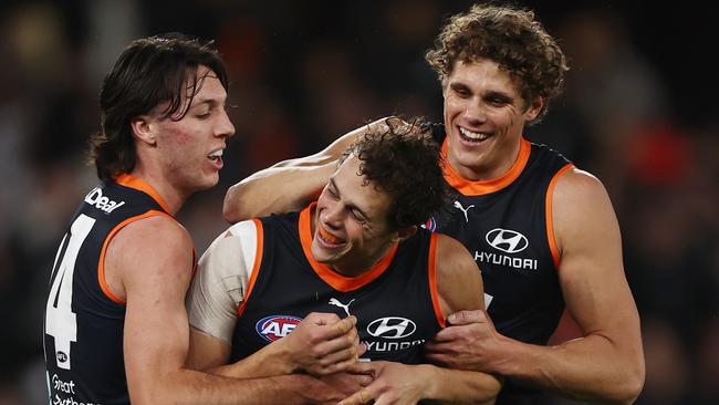 Ed Curnow celebrates a goal with his brother Charlie. Picture: Michael Klein