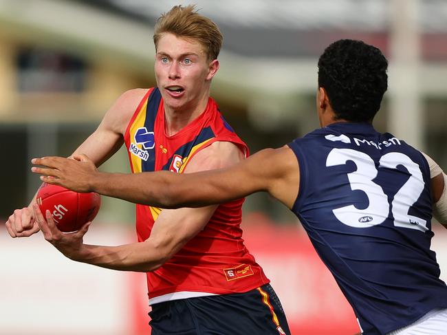 ADELAIDE, AUSTRALIA - June 30: Sid Draper of South Australia and Adrian Cole of Victoria Metro during the 2024 Marsh AFL Championships U18 Boys match between South Australia and Victoria Metro at Alberton Oval on June 30, 2024 in Adelaide, Australia. (Photo by Sarah Reed/AFL Photos via Getty Images)