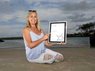 Tania Usher from Blue Ginger Picnics, displays her silver award from the recent Qantas Australian Tourism Awards. Picture: Scott Davis