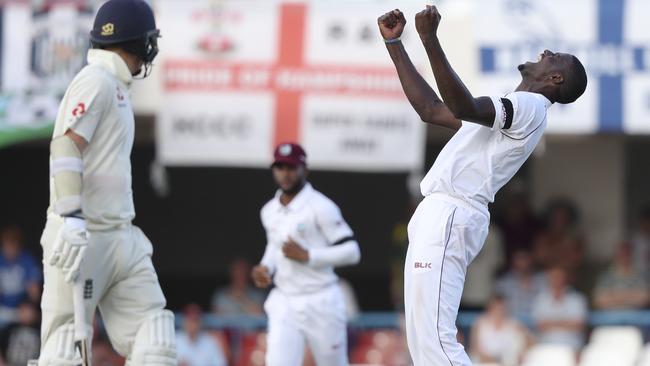 West Indies' captain Jason Holder celebrates taking the wicket of England's James Anderson  (AP Photo/Ricardo Mazalan)