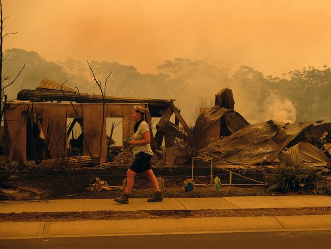 Bushfire arrives into the township of Malua Bay NSW, just south of Batemans Bay. Picture: Alex Coppel