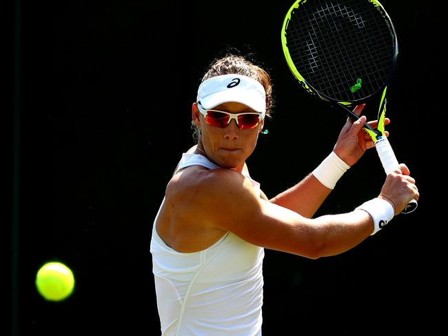 LONDON, ENGLAND - JULY 03:  Samantha Stosur of Australia returns against Shuai Peng of China during their Ladies' Singles first round match on day two of the Wimbledon Lawn Tennis Championships at All England Lawn Tennis and Croquet Club on July 3, 2018 in London, England.  (Photo by Matthew Stockman/Getty Images)