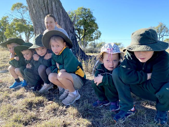 Jackson, George, Addison, Ella, Amy and Myles and Miss Gina faced freezing conditions at Lochington State School this morning