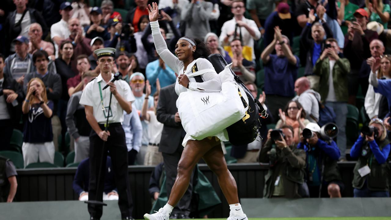 Serena Williams waves to the crowd after losing to Harmony Tan in the first round of Wimbledon last month. (Photo by Clive Brunskill/Getty Images)