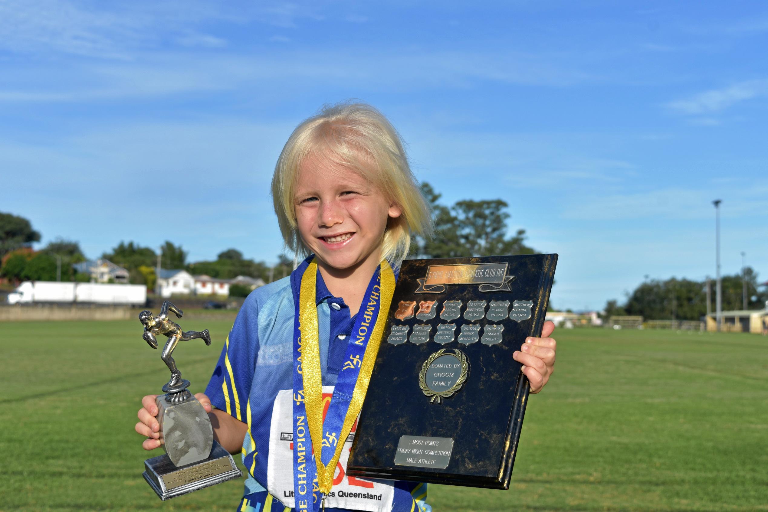 Athletics - Under 6 age champion, Adam and Courtney Cross shield winner under 6 winner, Groom Family Shield most points friday competition male and Friday Night Competition winner Loghan Roberts. Picture: Bec Singh