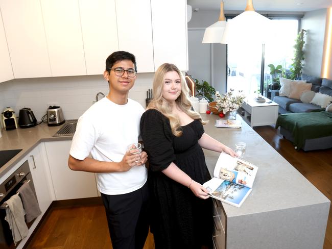 L to R, Radiant Thomas and partner Phoebe Burrows, Realestate, first home buyers saved for years to buy a property, Cannon Hill, on Thursday 24th August 2023 - Photo Steve Pohlner