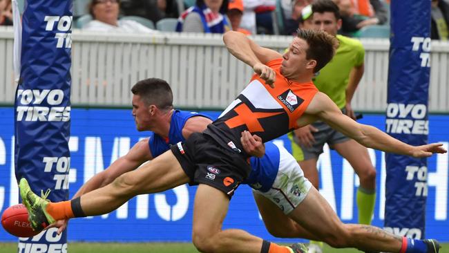 Toby Greene stretches out a boot to kick one of his four goals. Picture: AAP