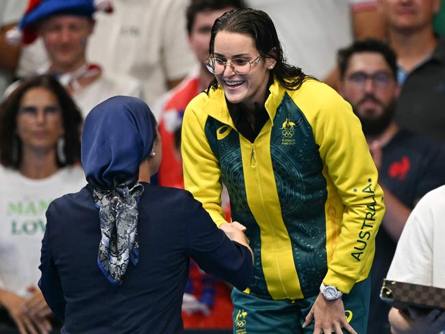 McKeown receiving her gold medal for women's 200m backstroke, completing the back-to-back double-double. Picture: Jonathan Nackstrand / AFP