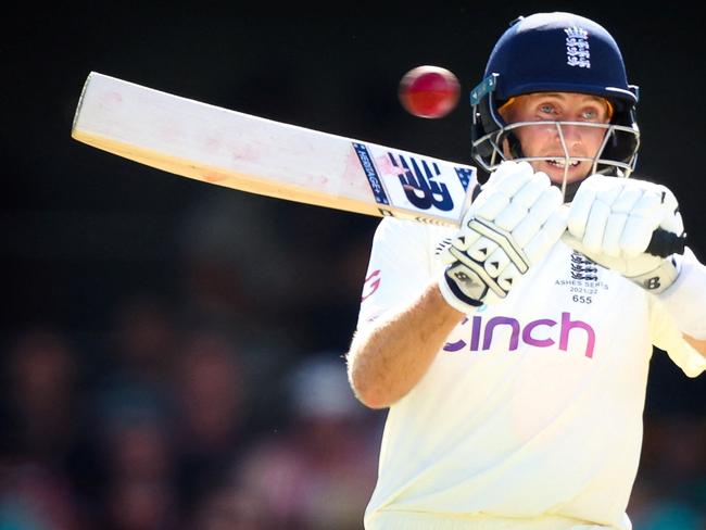 England's Joe Root bats during day three of the first Ashes cricket Test match between England and Australia at the Gabba in Brisbane on December 10, 2021. (Photo by Patrick HAMILTON / AFP) / -- IMAGE RESTRICTED TO EDITORIAL USE - STRICTLY NO COMMERCIAL USE --