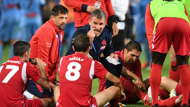 Adelaide coach Marco Kurz tries to lift his players before extra time. (AAP Image/David Moir)