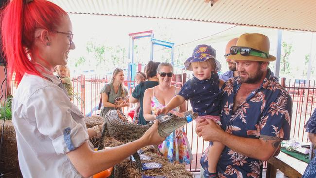 Tom  and son  Luke Prsa at the race that stops the rural area , The annual Croc Races at the Berry Springs Tavern to celebrate Melbourne Cup Day.Picture GLENN CAMPBELL