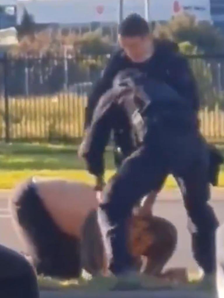 One officer appears to kick Mr Atkins before another stomps on his head. Picture: Twitter