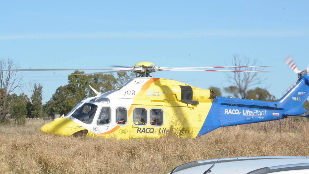 An RACQ Air Rescue helicopter at the scene on Monday. Picture: Michael Nolan