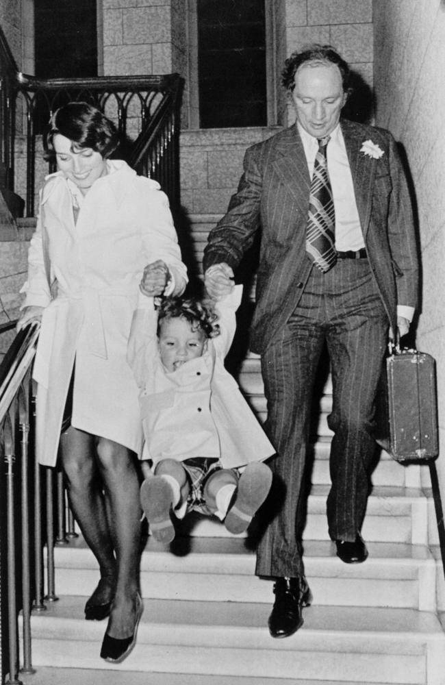 Canadian Prime Minister Pierre Trudeau, with his wife Margaret, hang on to Justin, May, 1974. Picture: AP Photo/Canadian Press