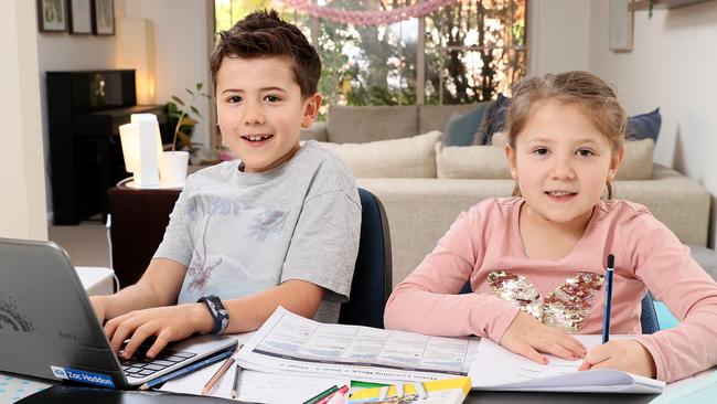 NSW Premier Gladys Berejiklian has announced primary school students will be able to return to school from October 25 after the Covid 19 lockdown closed schools and forced kids to be homeschooled. East Ryde students Zac Haddon 8 (Yr 3) and sister Adelle 6 (Yr 1) pictured at home getting ready to go back school. Picture: Toby Zerna