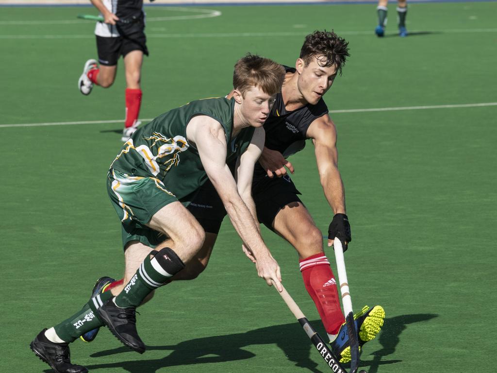 Trent Goldenstein, Ipswich and Joshua Baxter, Mackay. Ipswich vs Mackay. Hockey Queensland Championship. Saturday, May 1, 2021. Picture: Nev Madsen.