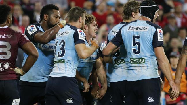 Michael Hooper led the Waratahs to a 29-26 win over the Reds in Brisbane.