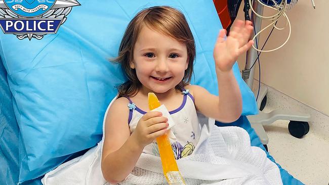 Little Cleo was pictured clutching an ice block shortly after she was rescued. Picture: AFP / Western Australian Police Force.